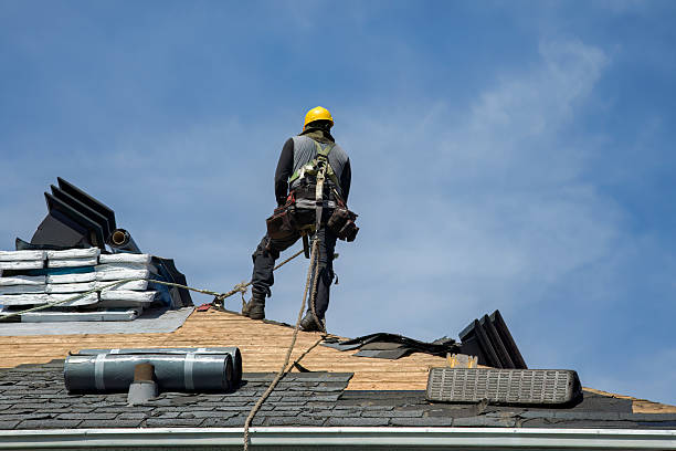 Professional Roof Replacement technician working in Russells Point, OH